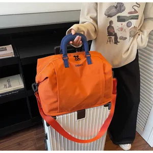 Large capacity travel duffel bag, expandable overnight luggage bag for business trips and fitness.