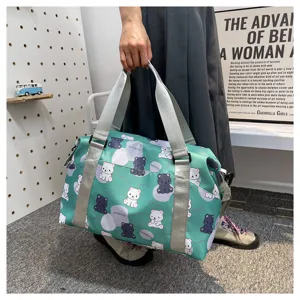 Cute bear print travel duffel bag detail, casual green shoulder luggage bag for women.