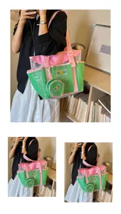 Detail shot of clear grid tote bag with pink straps and green pocket, showing design