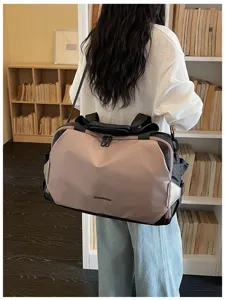 Stylish colorblock travel duffel bag for commuter fitness gym shoulder luggage board use.