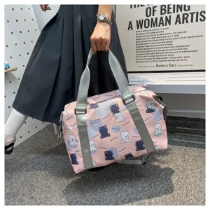 Cute bear print pink travel duffel bag with grey straps, perfect for weekend getaways and gym.