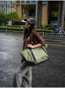 Large capacity canvas travel bag for outdoor commuting, short trips, and business travel.