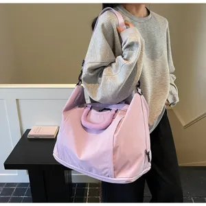 Large capacity travel duffel bag in light purple, lightweight and versatile for gym or trips.