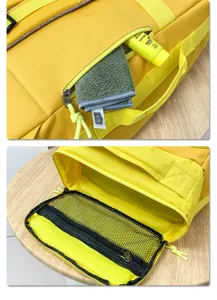 Backpack detail view showing front zipper pocket with storage and inner mesh compartment.