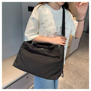 Fashionable plaid travel bag, casual shoulder crossbody bag for daily commuting and short trips.