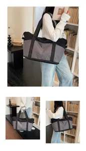 Large capacity travel duffel bag in black and gray grid pattern for outdoor fitness.