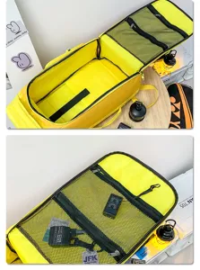 Large capacity yellow travel backpack detail showing multi-layer mesh pockets and spacious interior.