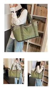 Detail view of large capacity travel duffel bag in canvas, lifestyle showcase with shoulder carry.