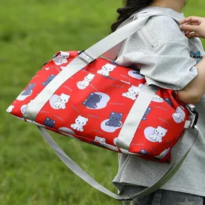 Cute bear print travel bag with shoulder strap, fashionable red canvas weekend duffle bag.