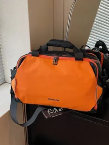 Colorblock travel duffel bag for short trips and fitness commute, stylish luggage bag.