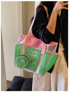 Transparent mesh beach tote bag with pink straps and small coin purse for swimming travel.