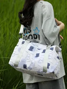 Cute bear print travel duffel bag with shoulder strap for women and men daily use.