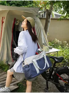 Stylish color-block travel duffel bag for outdoor camping, lightweight and spacious.