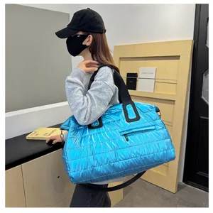 Stylish shiny quilted puffer travel duffel bag, large capacity tote for gym, sports and short trips.