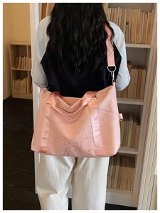 Pink star print travel duffel bag with shoulder strap, stylish casual commute gym and cabin bag.