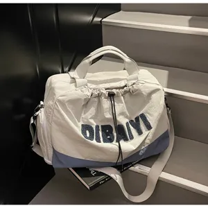Casual stylish travel duffel bag with chic color block design and adjustable shoulder strap