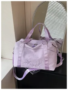 Lavender star print travel duffel bag with shoulder strap for weekend trips and gym use.