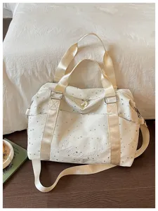 Stylish starlight printed travel duffel bag with shoulder strap for commuting and yoga.