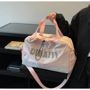 Pink travel duffel bag lightweight shoulder handbag for short trips and commuting gym.