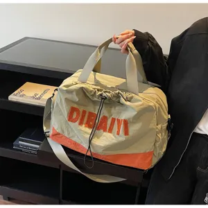 Detailed view of stylish travel duffel bag, casual commute shoulder bag with color.