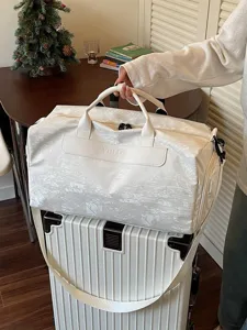 Sac de voyage léger et élégant pour femmes et hommes, idéal pour courts séjours et sport.