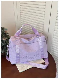 Purple star print travel duffel bag with shoulder strap, stylish gym and commuting tote.