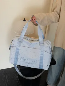 Light blue star print travel duffel bag with shoulder strap for women commuter casual
