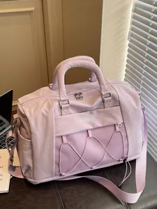 Light purple travel duffel bag, gym fitness sports tote with mesh pocket and adjustable strap.