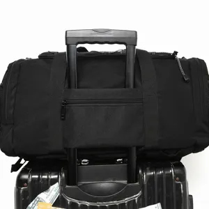 Black travel duffel bag with luggage sleeve for convenient outdoor and gym carrying.