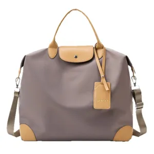 Large capacity waterproof travel duffel bag with leather handle and shoulder strap main view