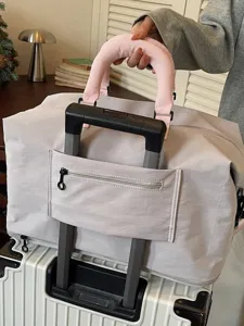 Bolsa de viaje con funda para trolley y asa rosa para escapadas y vuelos cortos