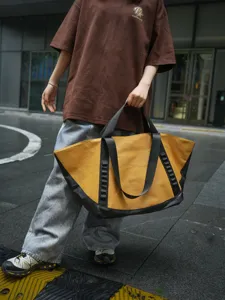 Large outdoor travel bag, durable weekend duffel camping handbag for business and short trips.