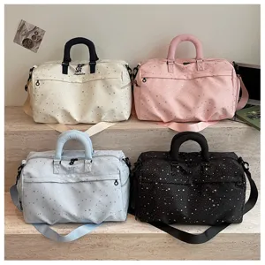 Large capacity travel duffel bag with star print, stylish gym shoulder bag for men and women.