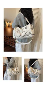 Large capacity canvas travel gym bag for outdoor sports, shoulder luggage bag detail view.