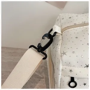 Duffle bag strap detail, lightweight travel gym bag with cute silver star pattern, durable.