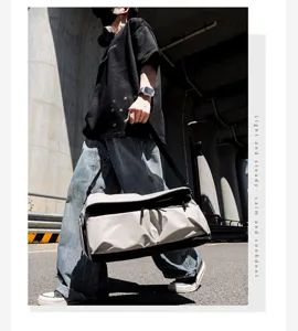 Casual multi-functional travel shoulder bag for men, large capacity commuter messenger bag.