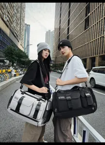 Multi-functional travel duffel bag for men and women, perfect for gym and outdoor trips.