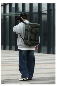 Stylish large capacity waterproof travel backpack for men, casual outdoor sports duffel bag.
