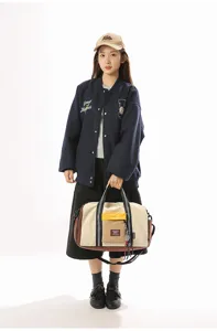 Large capacity travel duffle bag, stylish color block canvas bag for sports, fitness and short trips.