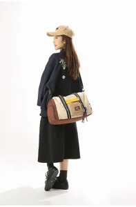 Large capacity travel duffel bag for women, stylish multi-color gym sports shoulder bag.
