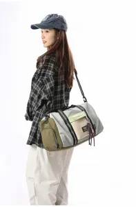 Large capacity travel duffel bag with shoulder strap for sports, gym and short trips.