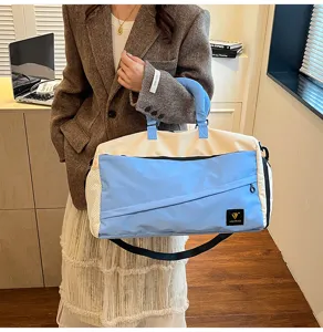 Color-block travel duffel bag for women, soft cotton handbag and shoulder gym bag for commute.