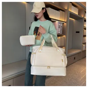 Large capacity travel duffel bag with separate shoe compartment and matching cosmetic pouch for gym.