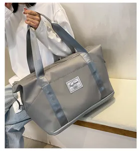Grand sac de voyage étanche gris pour le sport et les bagages avec fermeture éclair
