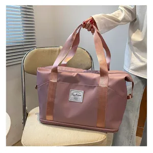 Grand sac de voyage étanche et fourre-tout pour le fitness et les week-ends en rose