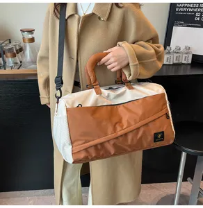 Contrast color travel duffel bag, soft cotton canvas, multi-purpose shoulder and gym bag.
