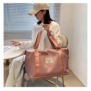 Grand sac de voyage imperméable, sac de sport et de fitness résistant pour femmes.