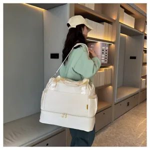 Large capacity travel duffel bag with shoe compartment, waterproof gym bag for women.