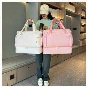 Large capacity travel duffel bag with separate shoe compartment and multiple pockets for fitness.