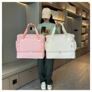 Large capacity fitness travel bag with double layer design, perfect for outdoor sports and trips.